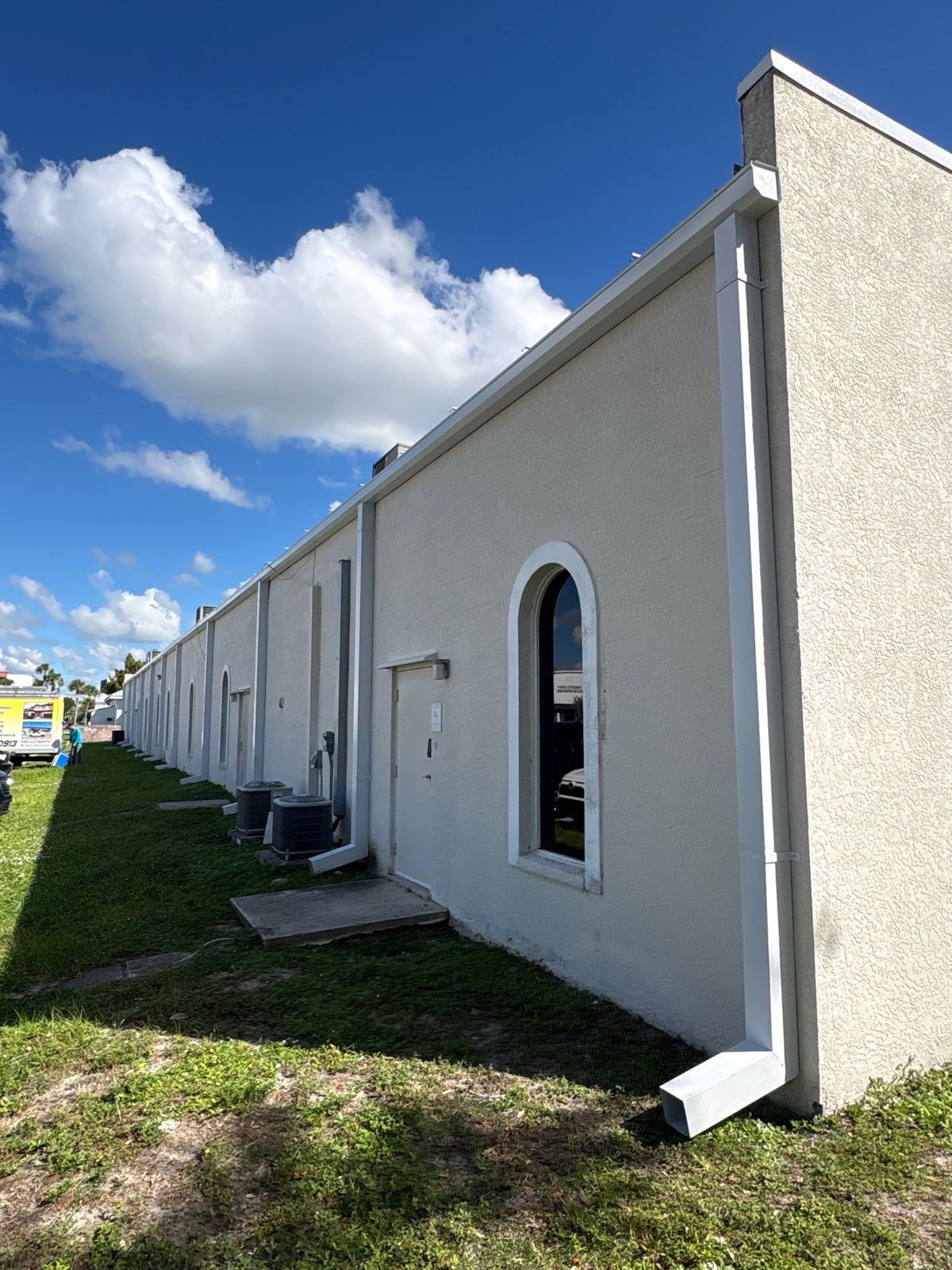 Gutters above arched windows